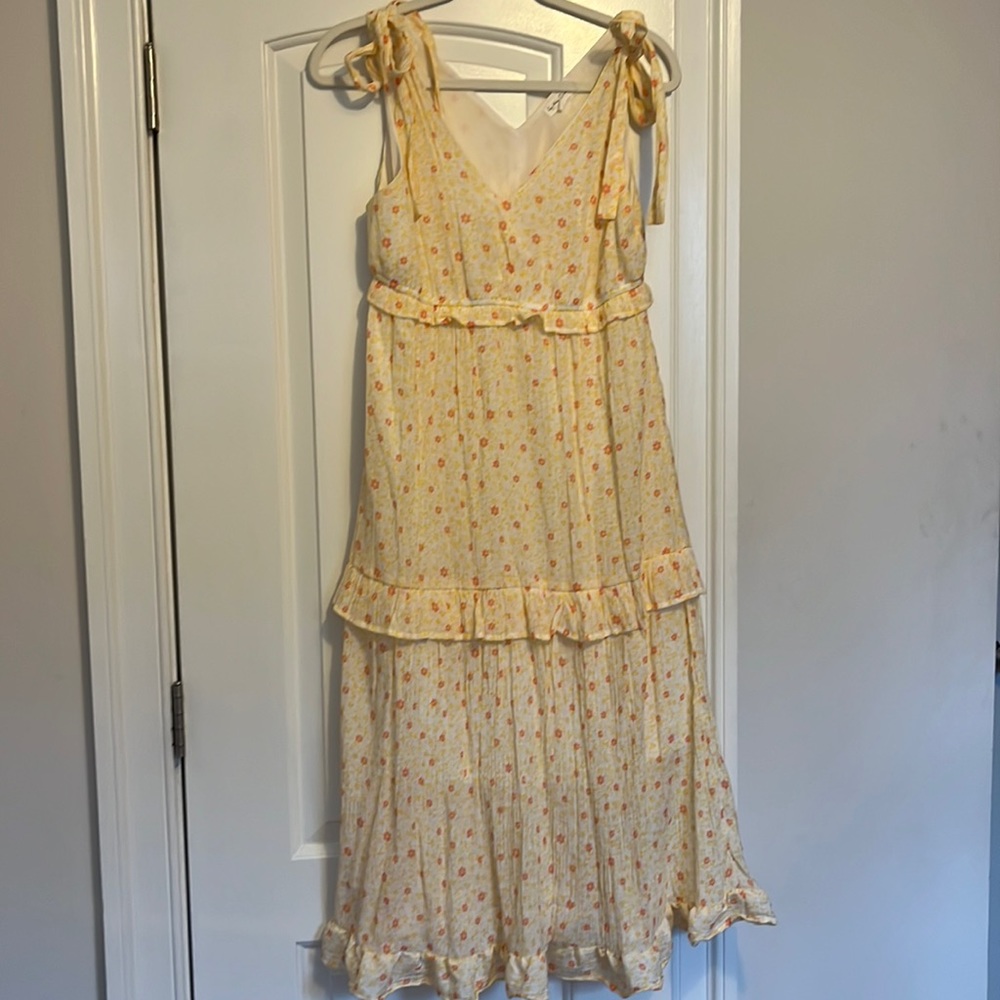 Adorable Yellow Tiered Midi dress with bow shoulder details